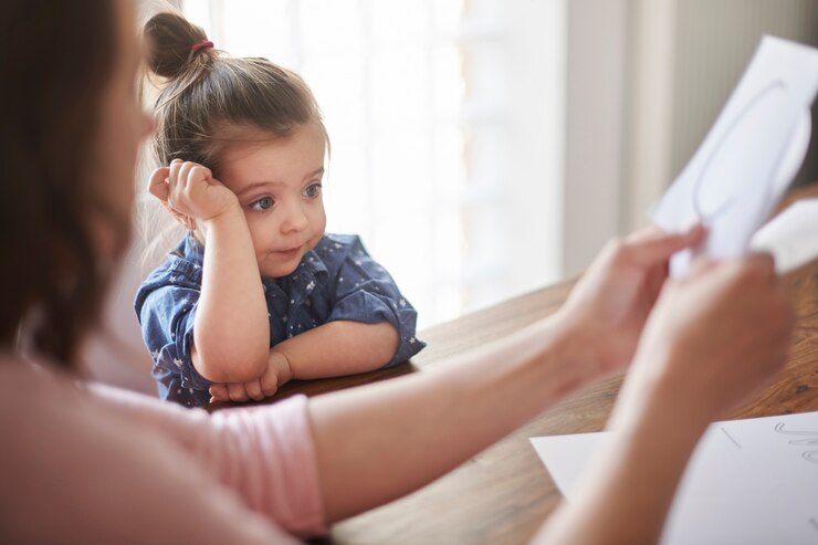 therapy session with a child therapist helping emotional development